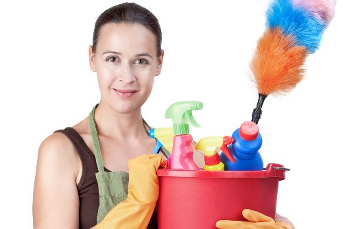 Professional oven cleaner in Richmond deep cleaning a home oven