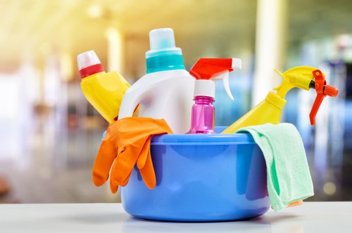 Cleaner washing windows on a Richmond property with care